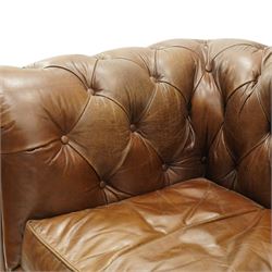 Timothy Oulton for Halo - two seater brown leather chesterfield settee, of traditional shape with rolled back and arms, upholstered in back-buttoned tan leather with loose seat cushions, raised on turned feet