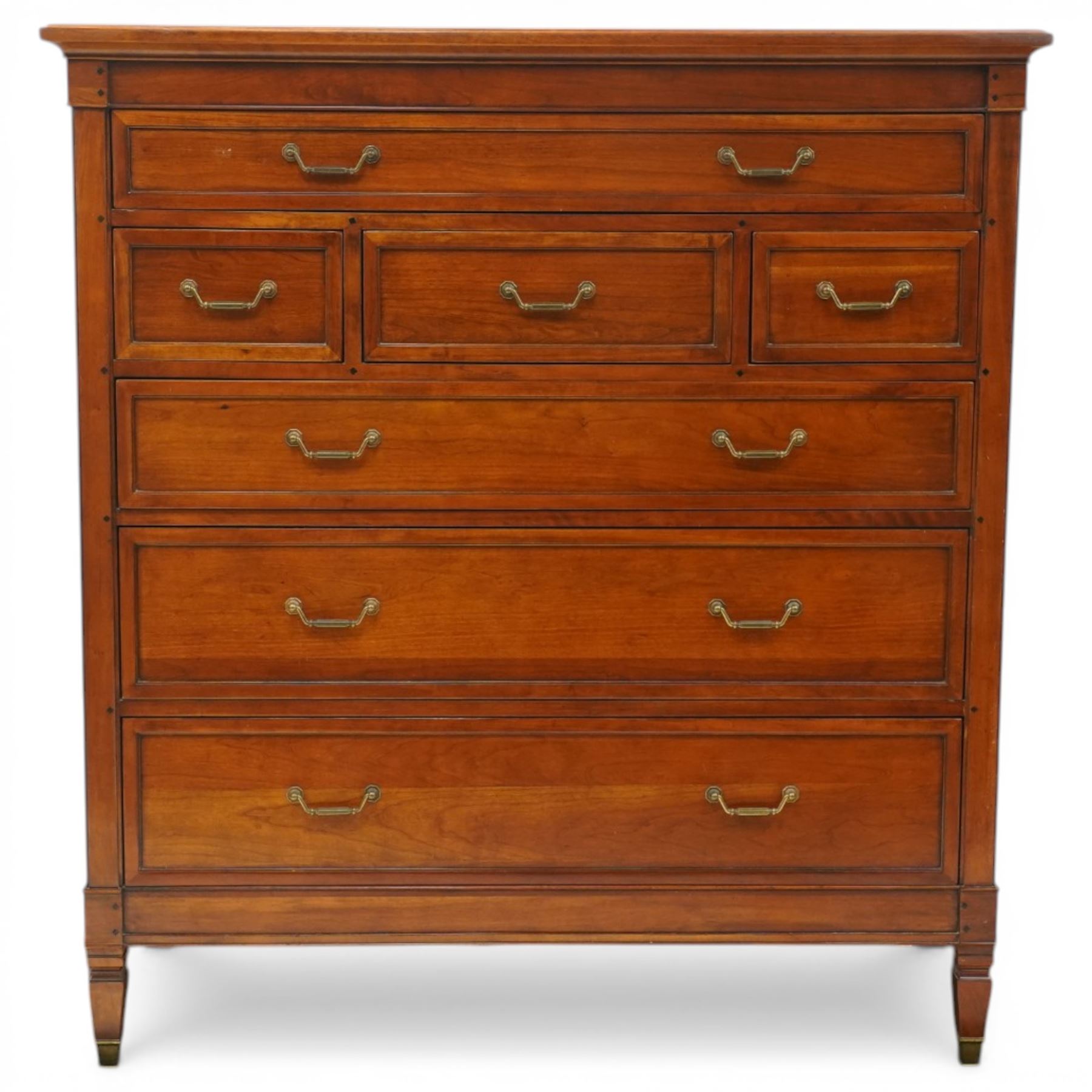 Willis & Gambier - 'Directoire' tall chest of drawers, rectangular top above an arrangement of seven drawers, raised on tapered and turned feet