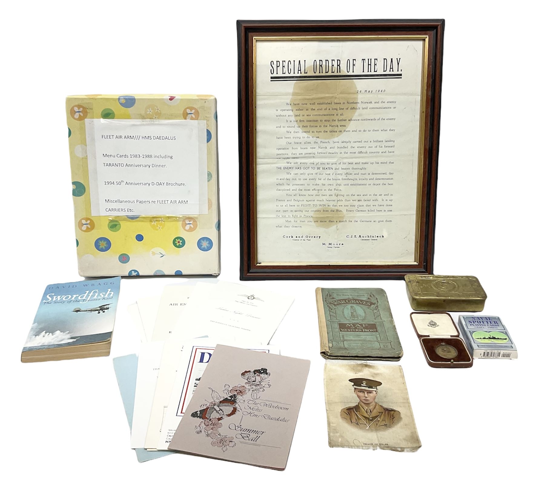 Framed WW2 'Special Order of the Day' poster date 24th May 1940 relating to Narvik in Norway; WW1 Princess Mary Christmas tin with quantity of uniform buttons; cigarette silk of the Prince of Wales in uniform; Royal Navy dinner menus, including HMS Daedalus Taranto forty-third, forty-fourth and forty-fifth anniversary dinners, 1983-1985, the wardroom mess summer ball, etc   