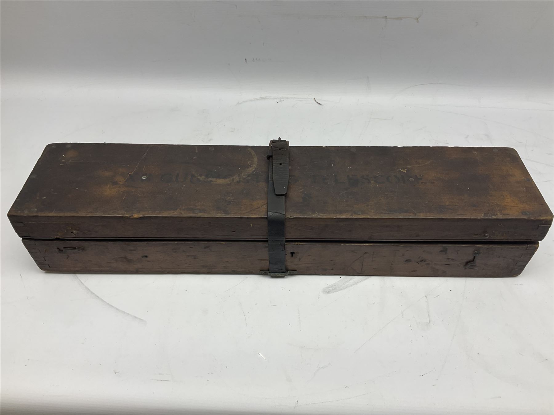 Early 20th century brass and black japanned gunsighting telescope inscribed 'G.S. Telescope X8 No.2127 W.G. Pye & Co Cambridge 1918 No.18' with X graticule to lens L53cm; in wooden box marked 'Gunsighting Telescope'