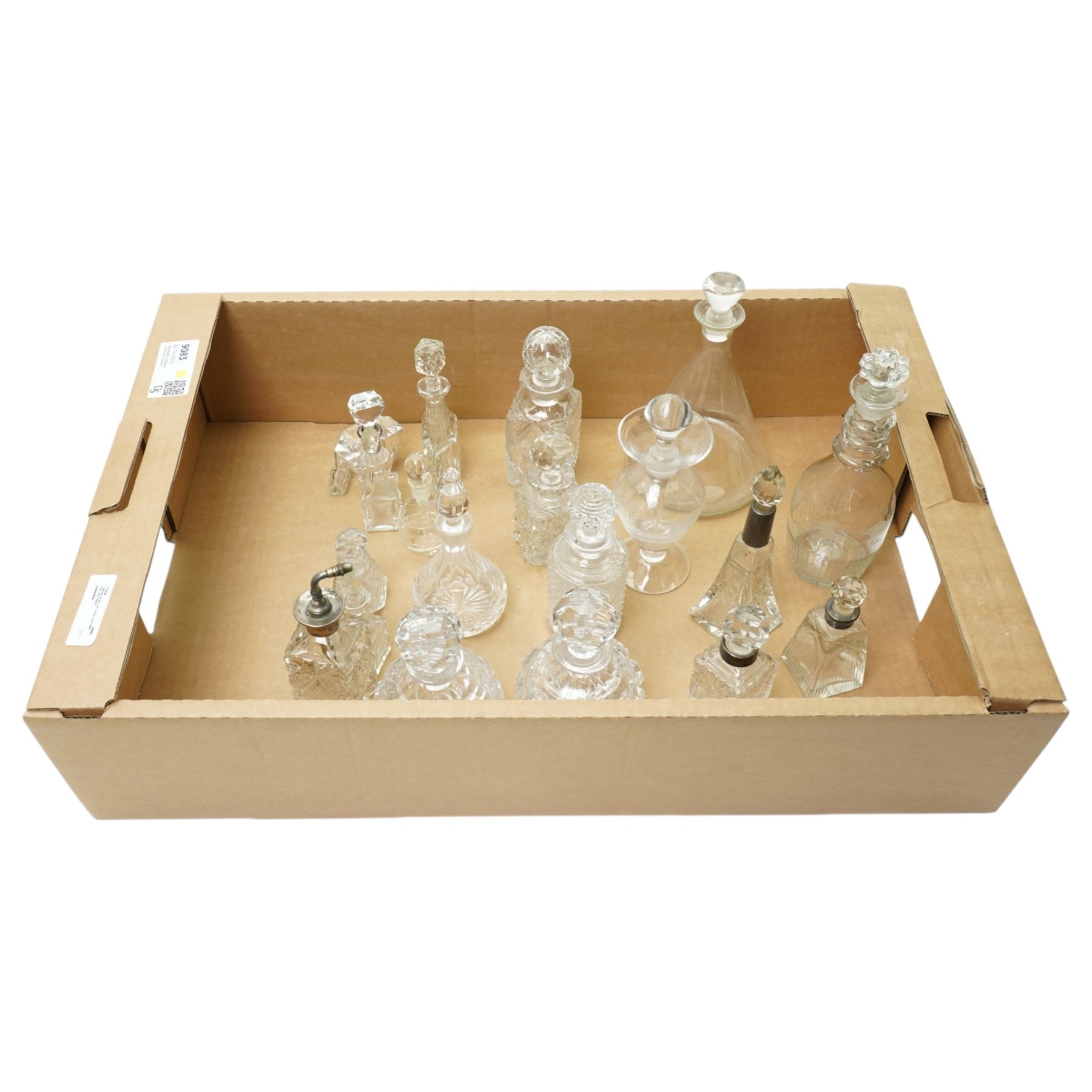 Glass atomiser with silver top, three glass scent flasks with silver collars, pair of cut glass globe scent flasks, other glass scent flasks and a 19th century etched glass liqueur decanter