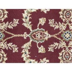 Contemporary Dunelm 'Legacy' ground rug, the field decorated with symmetrical scrolling foliate and floral motifs, bordered by an ivory band with repeating floral designs interspersed with leafy branches, inner guard stripe with fine linear patterning