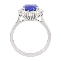 18ct white gold oval cut sapphire and round brilliant cut diamond cluster ring, hallmarked, sapphire approx 3.85 carat