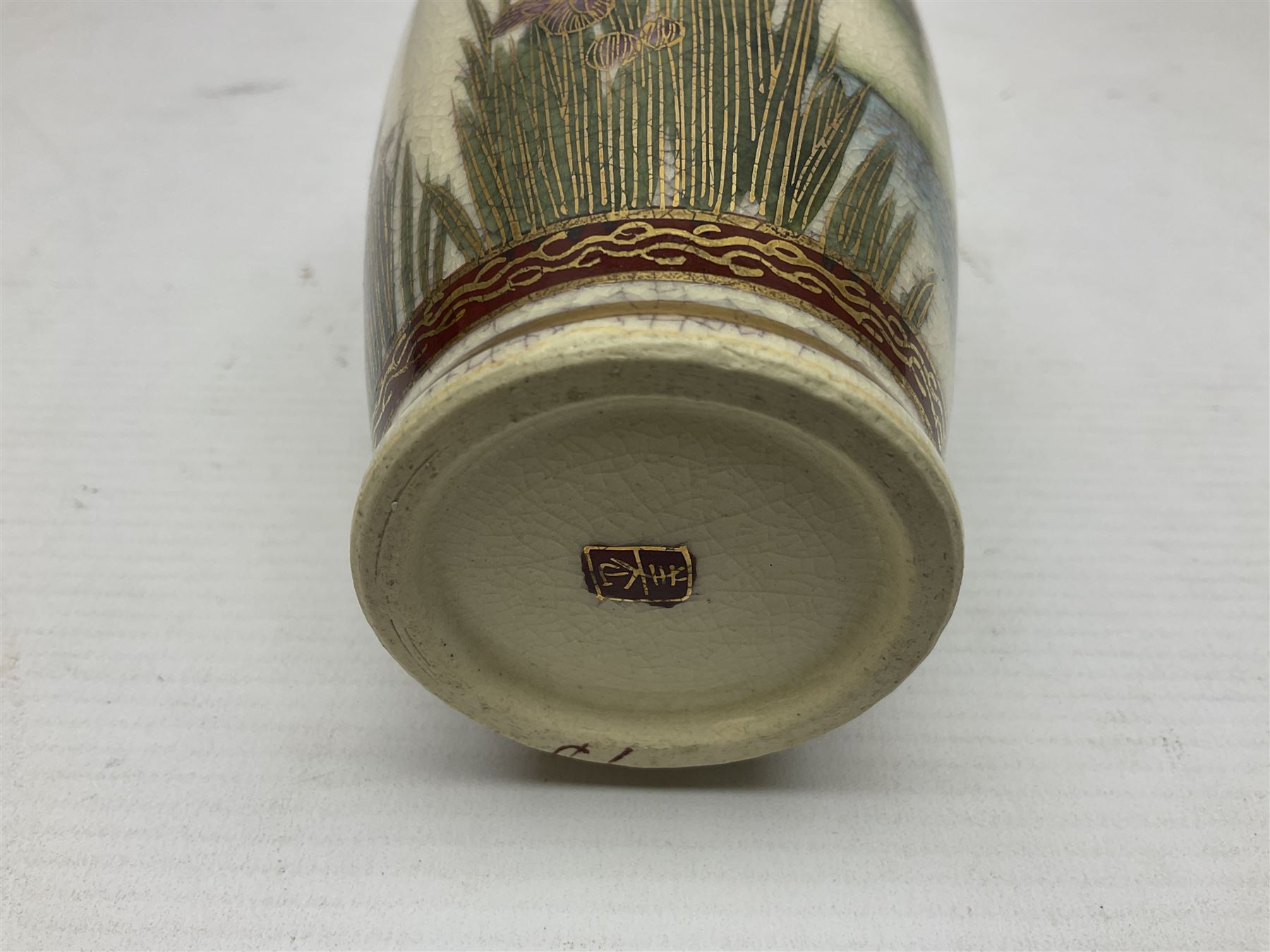 Japanese Satsuma Meiji period vase painted with a mountainous river landscape scene with wisteria and irises; together with a pair of similarly painted small dishes, signature beneath, vase H15cm