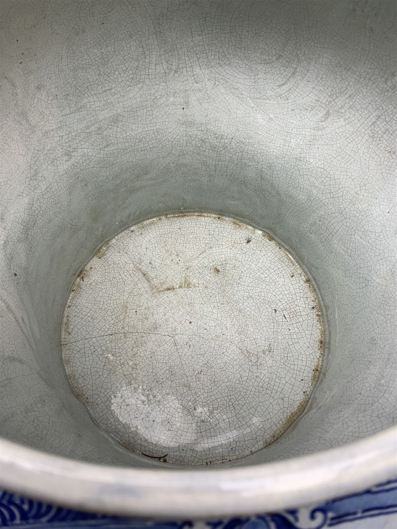 Large 20th century Delft blue and white jardinière, of baluster form with twin zoomorphic mask lug handles, decorated with hand painted panels of waterside scenes, within foliate surround, impressed and painted marks beneath for De Porceleyne Fles workshop, Delft, H35cm, rim D32