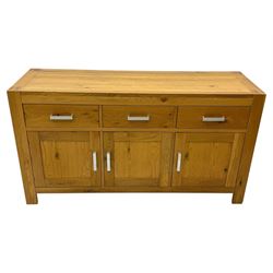 Light oak sideboard, fitted with three drawers and three cupboards, metal handles