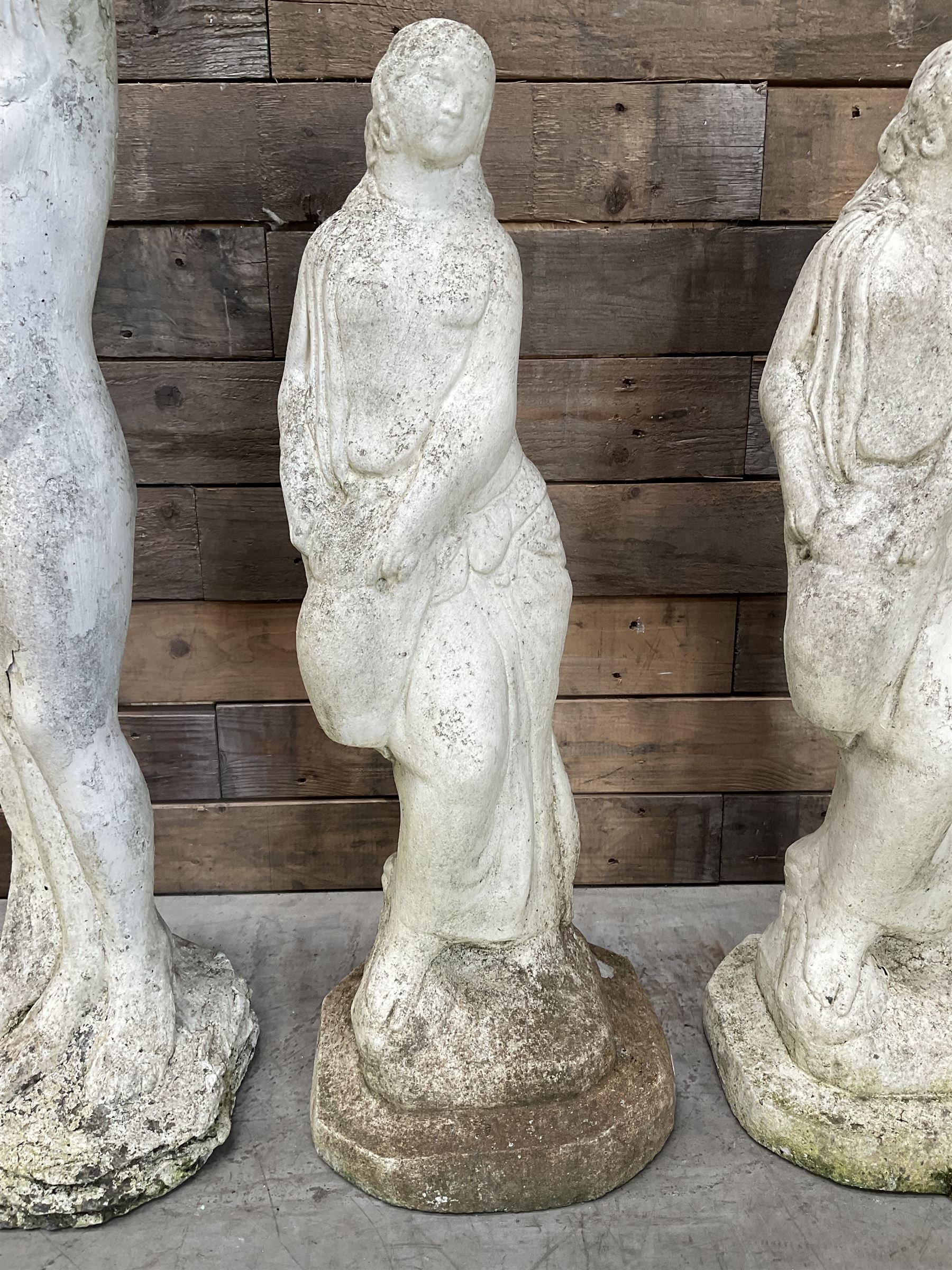 Four cast stone maiden figures, small bird bath and planter