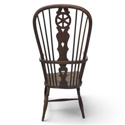 19th century Provincial wheelback Windsor armchair, high stick back, saddle seat on four turned legs with H-stretchers
