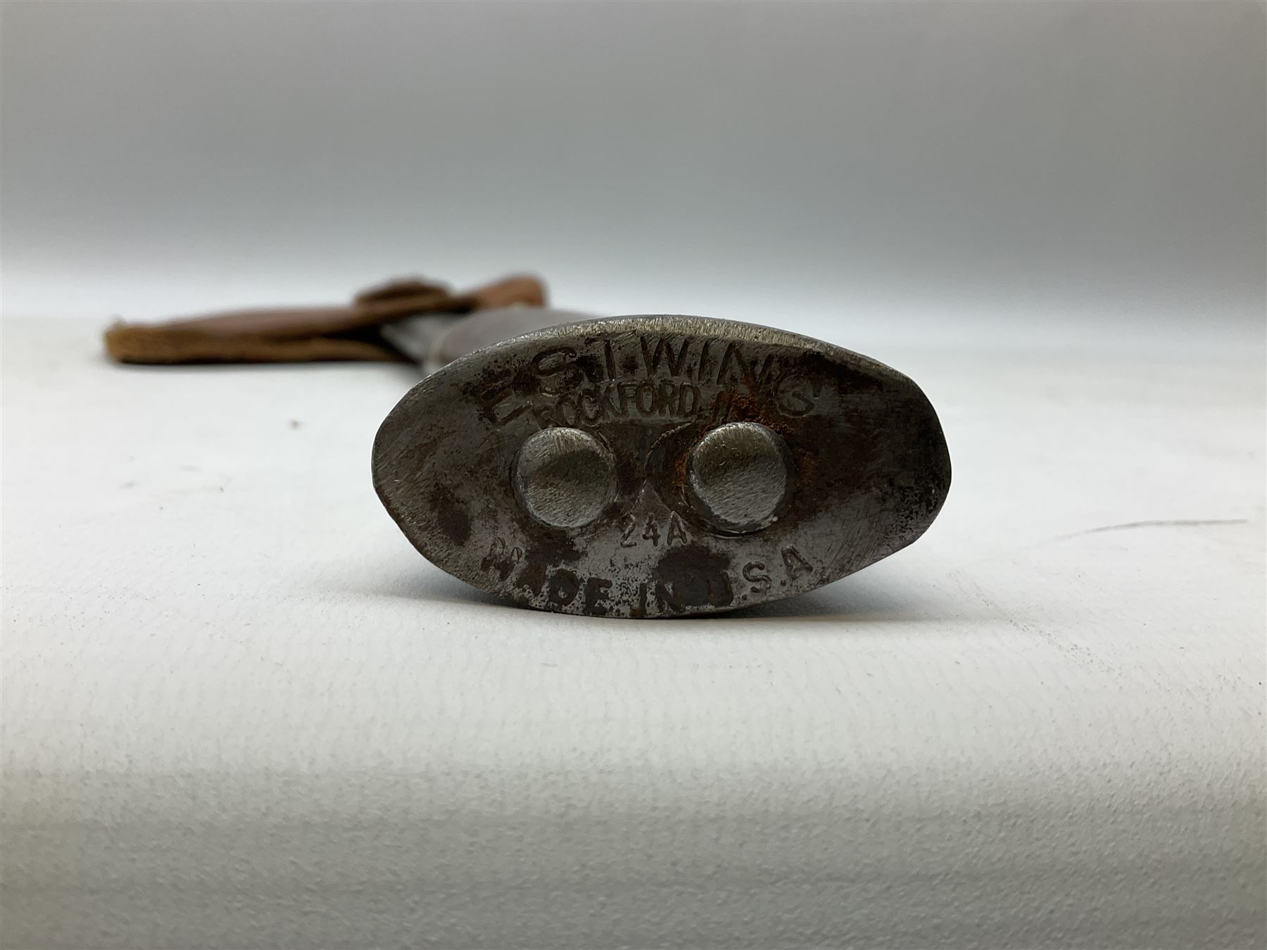 Estwing Black Eagle style double bit throwing axe with leather grip, virtually mint with labels present, plastic blade protectors and nylon sheath L43cm; another smaller Estwing axe stamped 24A to the pommel, with leather grip and sheath; and a vintage short handled hedge knife, the blade stamped IH (?) No.2 (3)