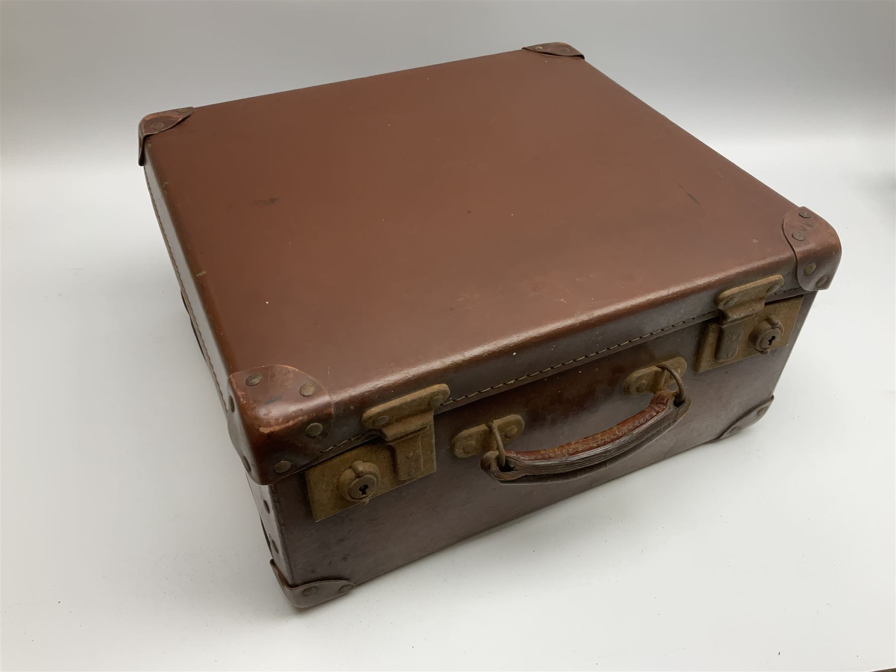 Small German Alvari piano accordion with blue pearline case, thirteen keys and eight buttons L30cm; in carrying case