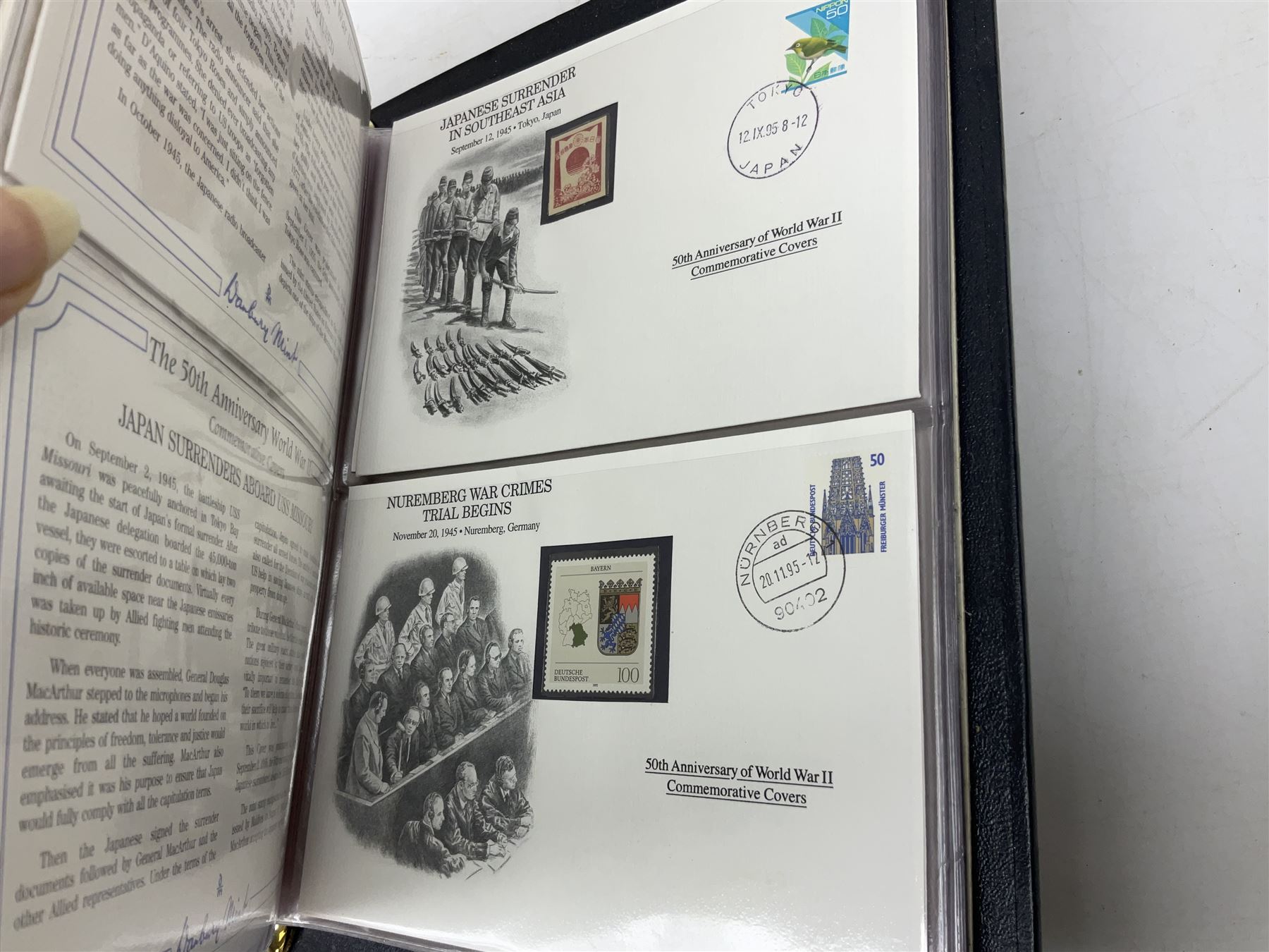 Three albums of 'The 50th Anniversary World War II Commemorative Covers Collection', housed in the official Danbury Mint folders