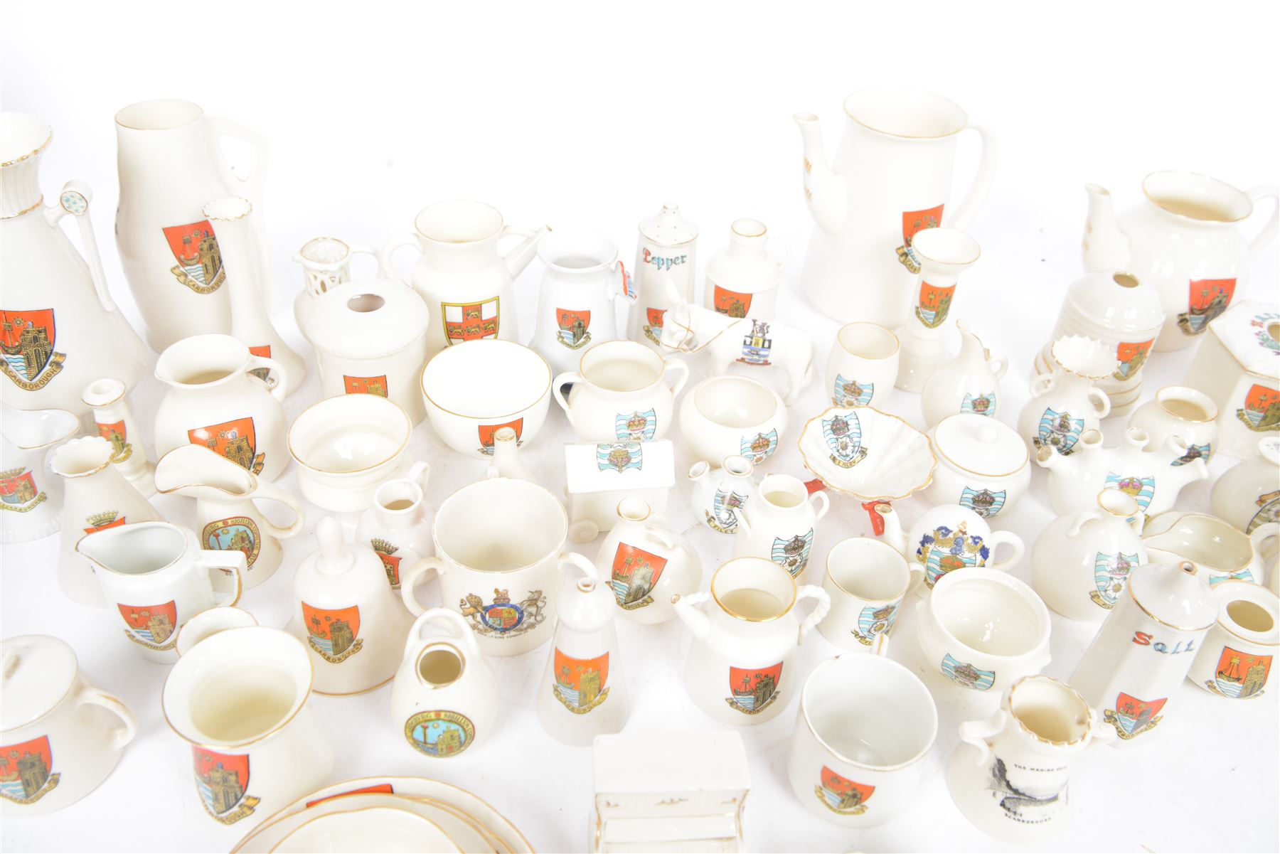 Large collection of Scarborough, Filey and Yorkshire Crested ware, including vases, teapots, jugs, bells etc