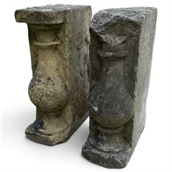 Pair of George III weathered carved sandstone architectural corbels, each with a projectin...