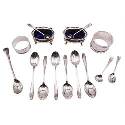 Group of silver to include set of six 1930's coffee spoons, hallmarked Arthur Price & Co Ltd, Birmingham 1932, pair of 1920's open salts with blue glass liners, each of oval bellied form with shaped rim, upon four pad feet, hallmarked Adie Brothers Ltd, Birmingham 1926, a 20th century napkin ring, hallmarked Cooper Brothers & Sons Ltd, Sheffield, date letter worn and indistinct, 1920's napkin ring, pair of late Victorian salt spoons, etc., approximate silver weight 7.77 ozt (241.7gm)