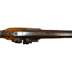  Late 18th/early 19th century continental flintlock hunting rifle the walnut stock with brass butt, chequered fore-end carved with a lion mask, brass trigger guard, chased lock plate, 95cm octagonal barrel inscribed Johann Novak un Klattau and brass mounted under-barrel ramrod 135cm overall  