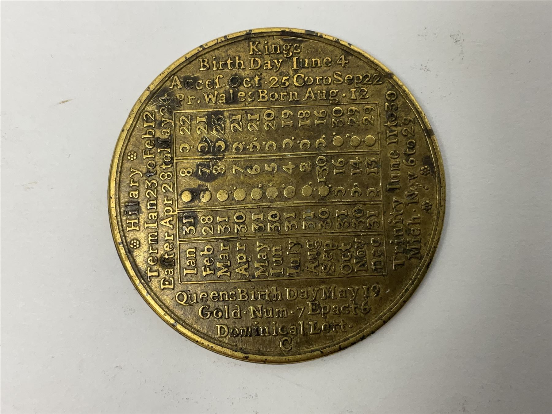 18th century brass calendar medal, for 1756, by John Powell, with moonphase calendar to reverse 