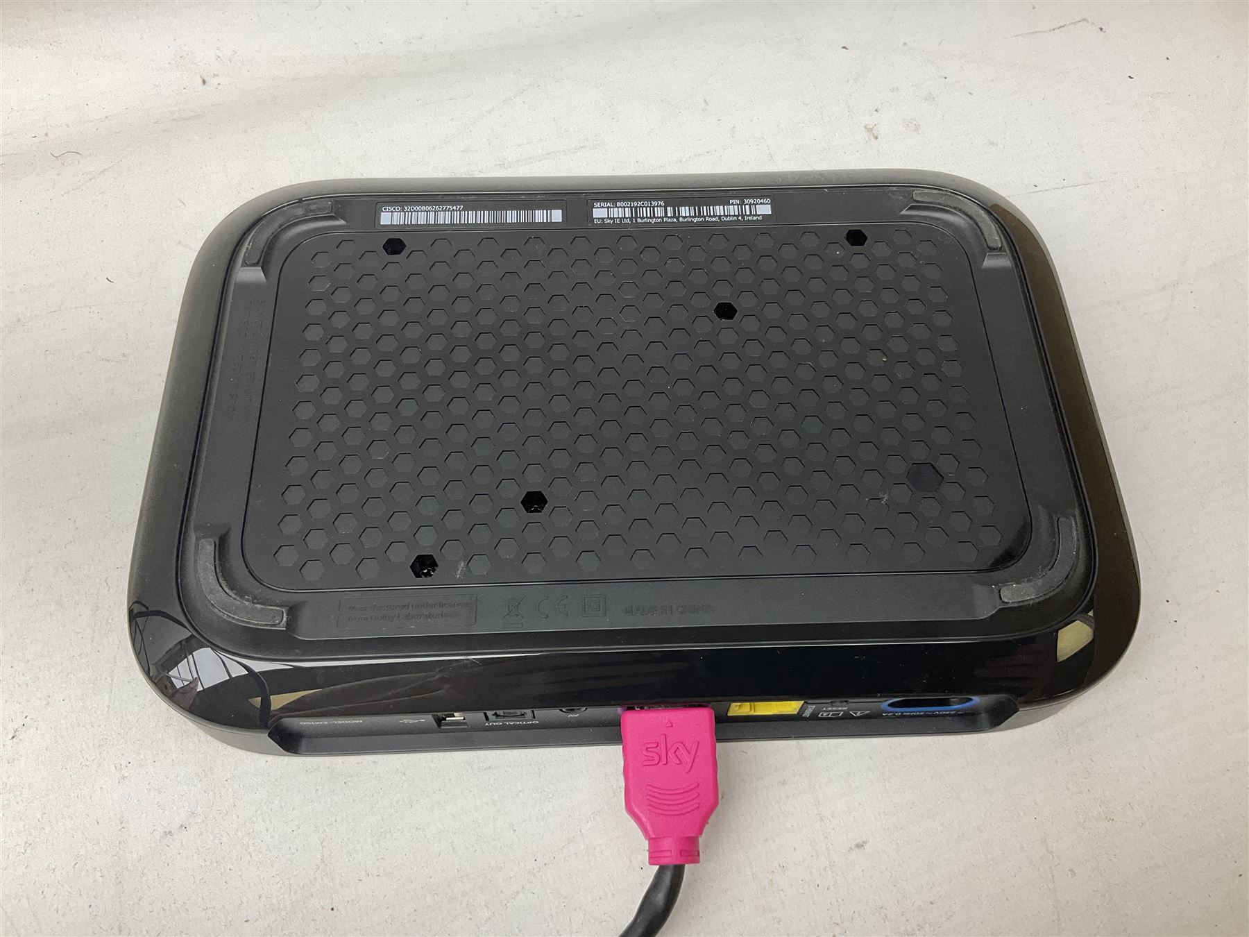 Sky Q box together with two mini room boxes with remotes and a quantity of remote controls and cables
