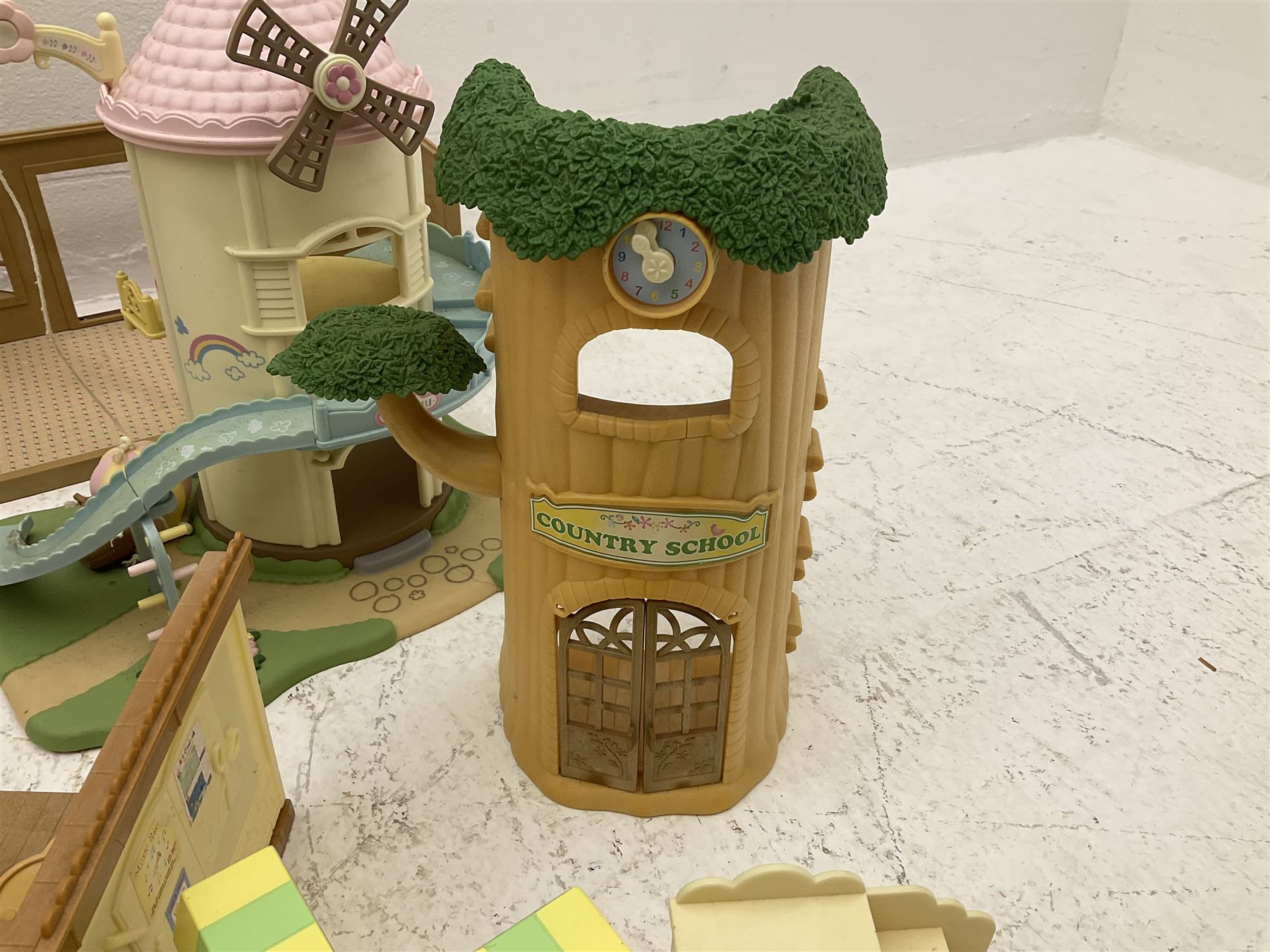 Quantity of stuffed toys and dolls to include Teddy Ruxpin, Cabbage Patch, Troll doll, and a quantity of plastic toys including Sylvanian Families Country School etc, in two boxes