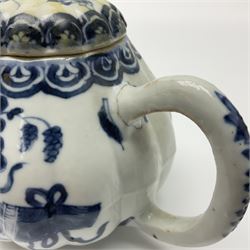 18th century Chinese blue and white teapot, painted with floral sprays, with lobed body and cover, H11cm