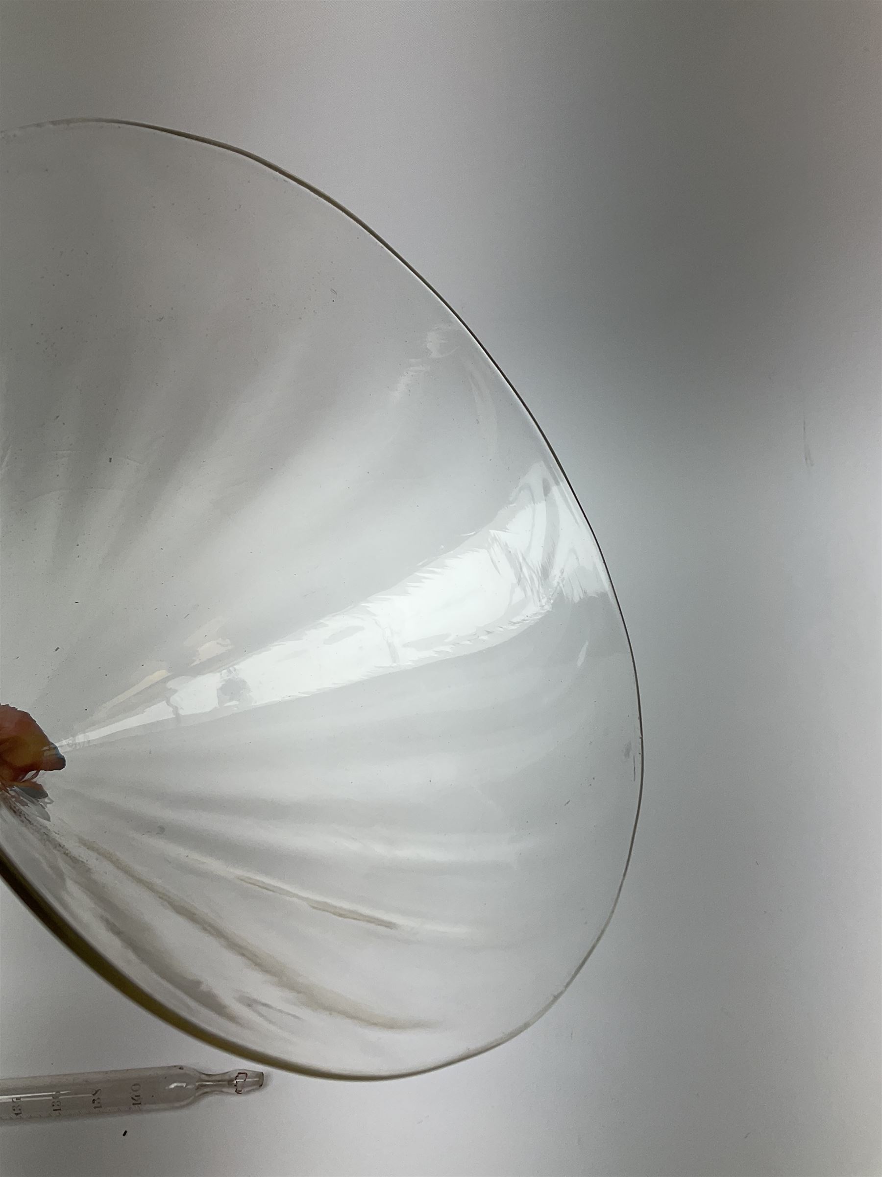 Collection of 19th century and later pharmaceutical laboratory glass, to include, large filter funnel, graham condenser, conical flask, bell jar and another with graduated tube, Provenance: discovered in the storeroom of a long established Hull pharmacist and opticians