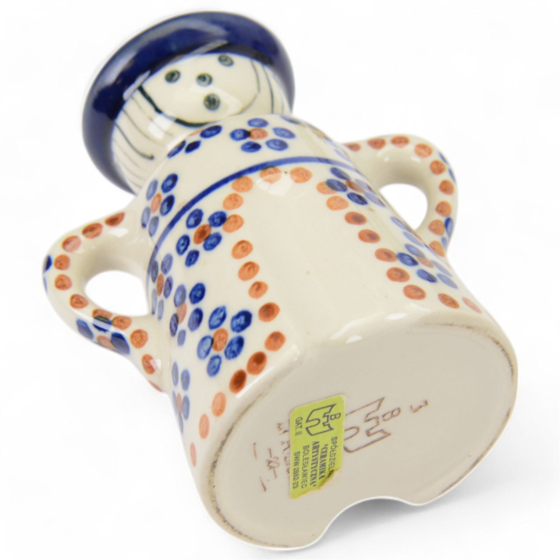 Collection of Ceramika Artystyczna Boleslawiec ceramics and similar Polish ceramics, including cheese dome in the form of a lady, chopping board, fruit bowl and figural candlestick