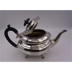 1920s silver teapot, of oval faceted form, with Bakelite type handle and finial, with presentation engraving to body, and upon four paw feet, hallmarked Northern Goldsmiths Co, Birmingham 1929, H16cm