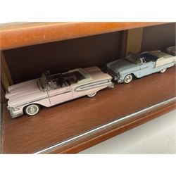 Franklin Mint 'The Classic Cars of the Fifties' collection with display rack, eleven (ex.12) die-cast models and folder of paperwork; another wall mounting display cabinet containing fifteen die-cast models; and an unused boxed Master Tools model display case