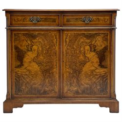 Georgian design figured walnut sideboard, moulded rectangular crossbanded top over two drawers and two cupboards, highly figured door fronts, canted and fluted upright corners, on bracket feet
