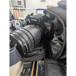 Collection of cameras and photography equipment, including Canon EOS 1000F DSLR, Fujifilm S9500, Canon EOS 10, lenses, filters, tripods, etc, in three boxes