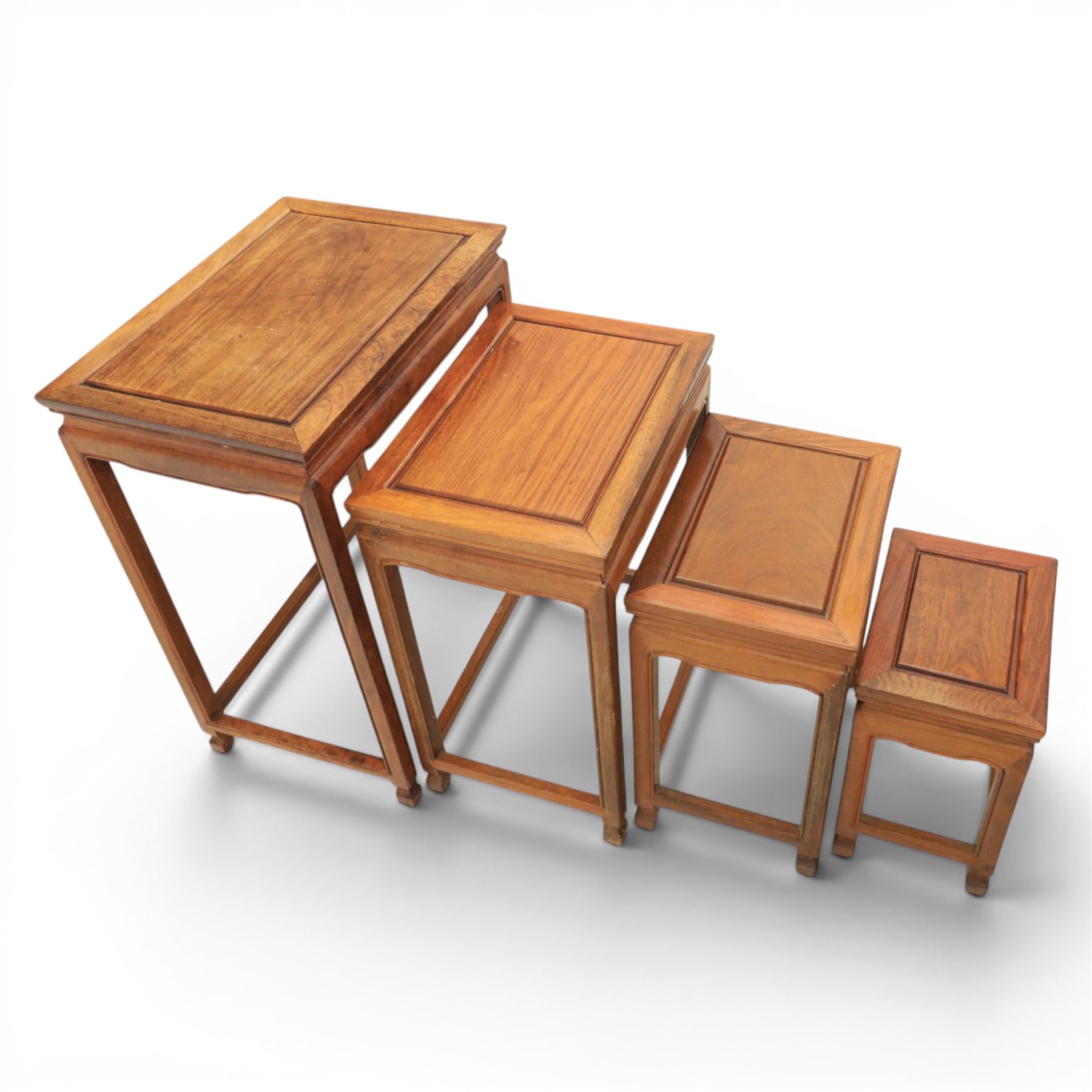 Chinese hardwood quartetto nest of tables, moulded rectangular top, square tapering legs terminating in spade feet