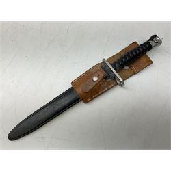 Swiss Model 1957 SIG rifle bayonet by Wenger with 23.5cm steel blade numbered 350857; in plastic scabbard with leather frog stamped GSCH 85 L38cm overall; and Egyptian Hakim rifle bayonet with the same script number to the grip and steel scabbard (2)