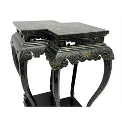 Chinese black lacquer double jardinière stand, the double-lozenge top painted with traditional landscape scenes within a gilt strung border, the pierced frieze with trailing foliate decoration and geometric patterns over the shaped projecting apron, supported on six cabriole supports united by a hexagonal undertier, raised on compressed spade feet
