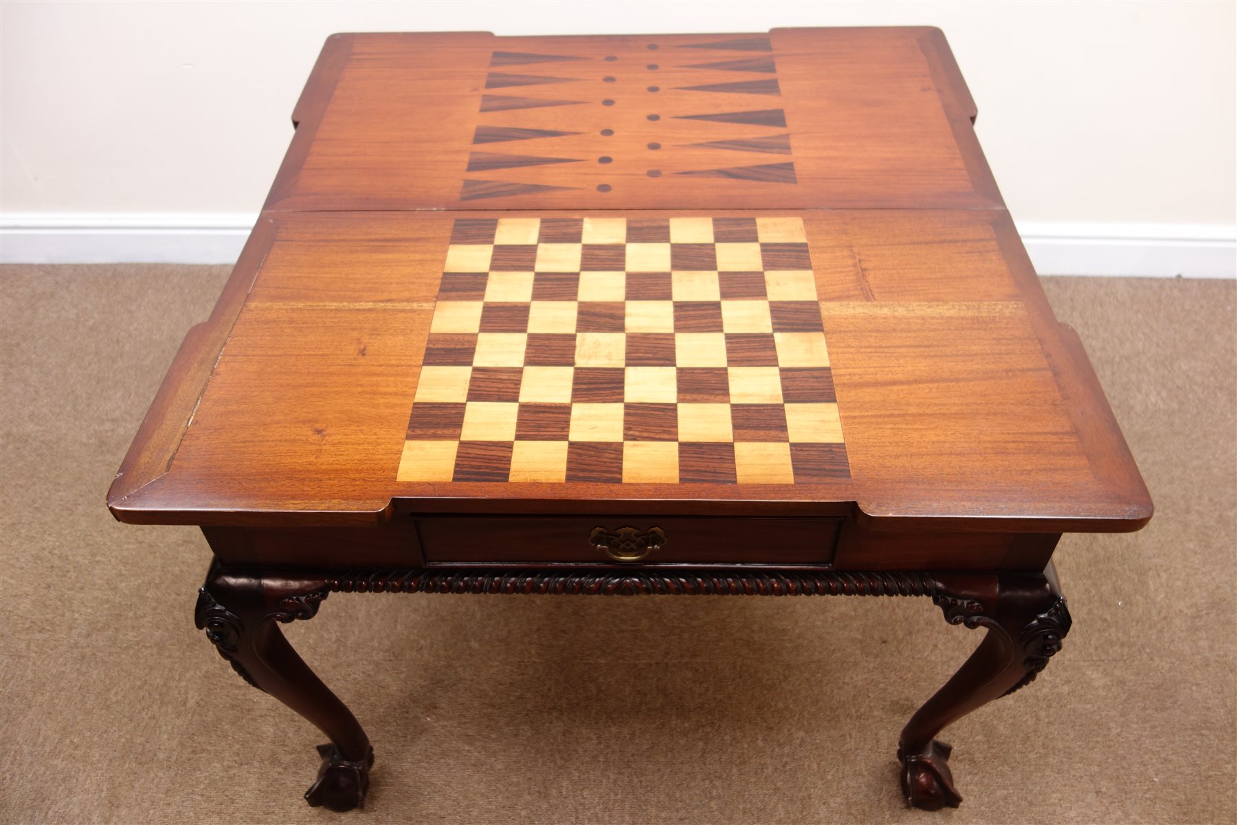 style mahogany games table, hinged lid enclosing inlaid chess