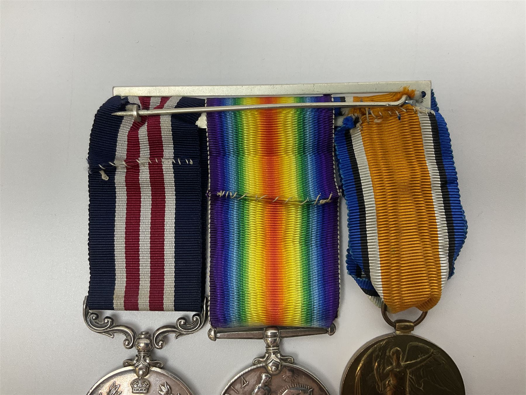 WW1 Military Medal group of three comprising MM, British War Medal and Victory Medal awarded to 44772 Pte. T. Clamp 5/York: & Lanc: R.; all with ribbons on hanging bar