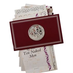 John Pinches 'The 100 Greatest Masterpieces' set of one hundred silver medallions, each on presentation card with information leaflet, together with the corresponding wooden display cabinet