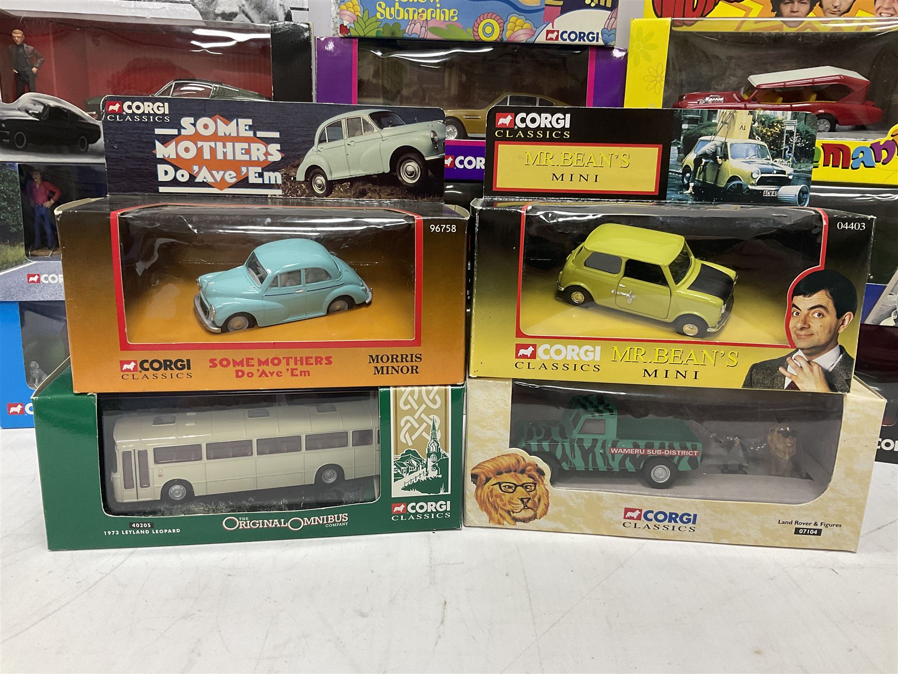 Corgi - sixteen TV/Film related die-cast models including Fawlty Towers, Bullitt, Beatles, Buster, Mr. Bean, Some Mothers,  Monkees, Ballykissangel, Heartbeat, The Avengers, Smokey & The Bandit etc; all boxed (16)