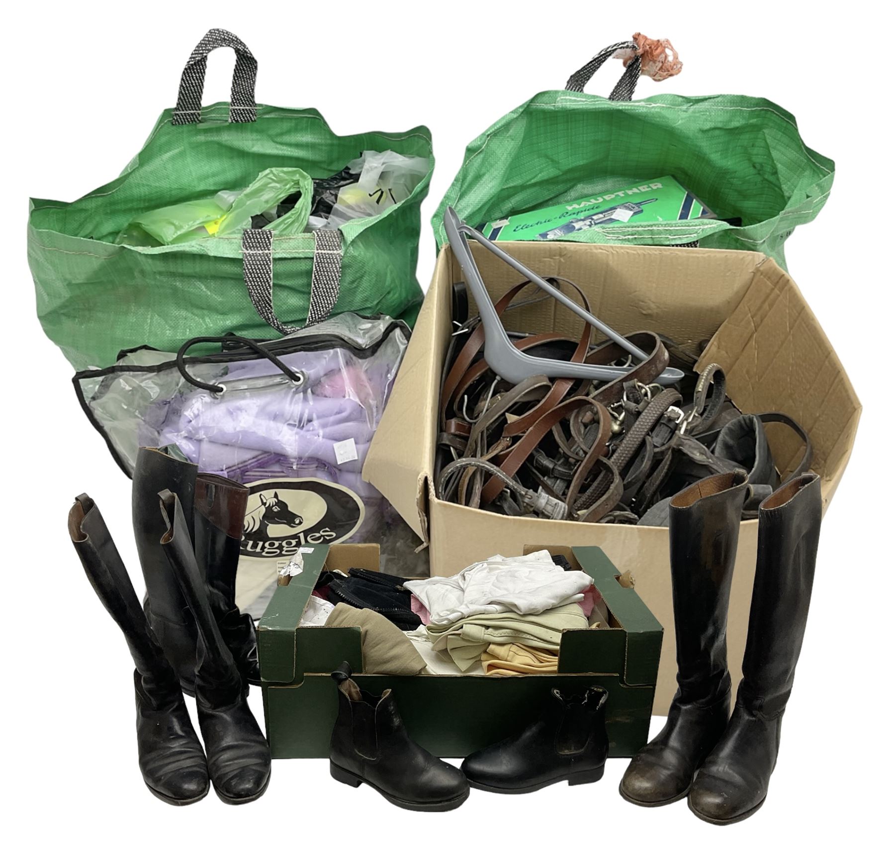 Quantity of horse tack and equipment to include Hauptner electric horse clippers, The Horseman Electric Clippers, bits, bridles, girths, rugs, jodpa boots etc  
