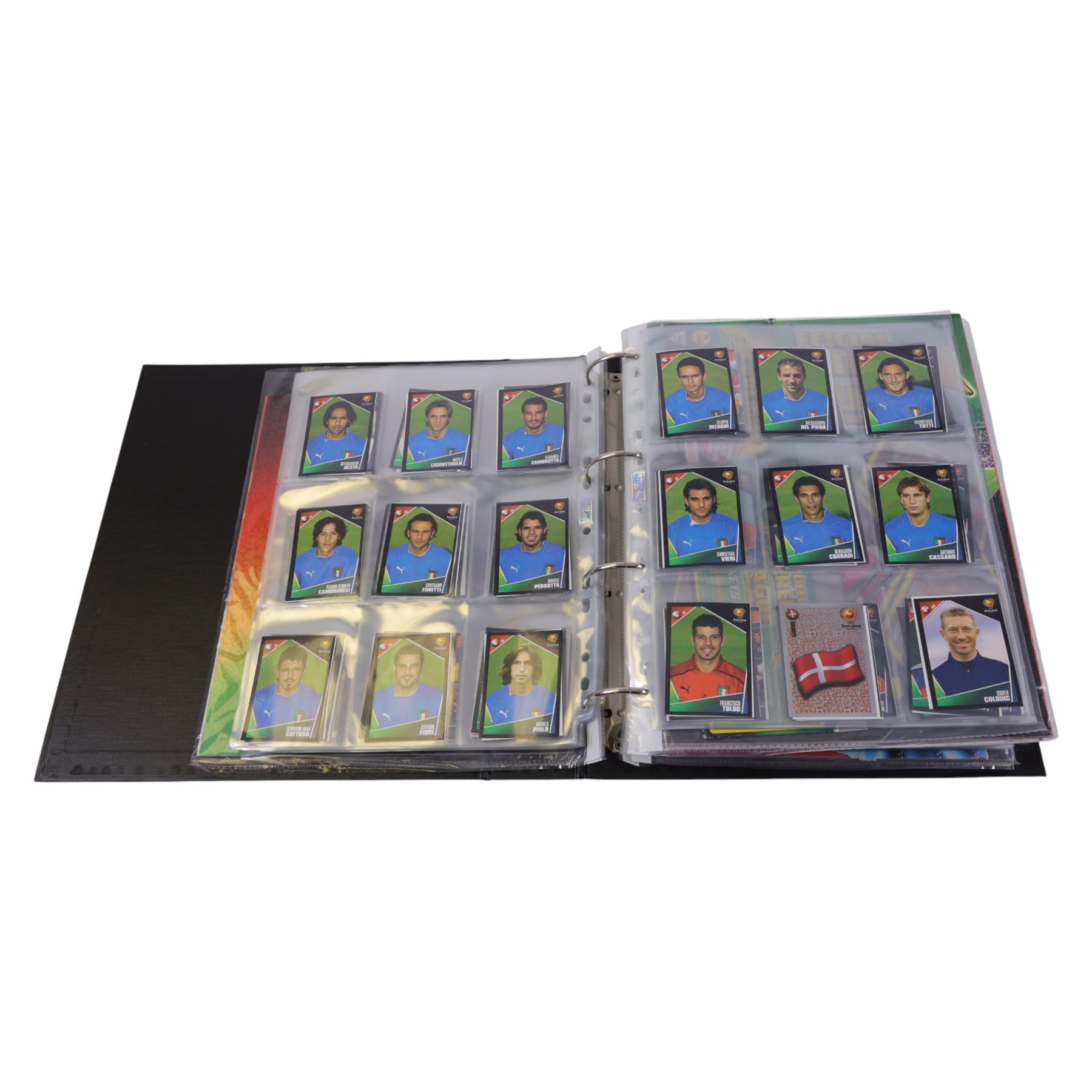 Collection of Football related stickers and albums, including Portugal Euro 2004 unused album and a collection of stickers,  Merlin The Official FA Premier League Sticker Collection 10th Edition 2003 unused album and stickers, Merlin The Official FA Premier League Sticker Collection 11th Edition 2004 unused album, Merlin The Official FA Premier League Sticker Collection 2001 unused album and stickers, Merlin The Official FA Premier League Sticker Collection 2002 unused album and stickers and Merlin's 2002 England unused album and stickers, housed in two folders