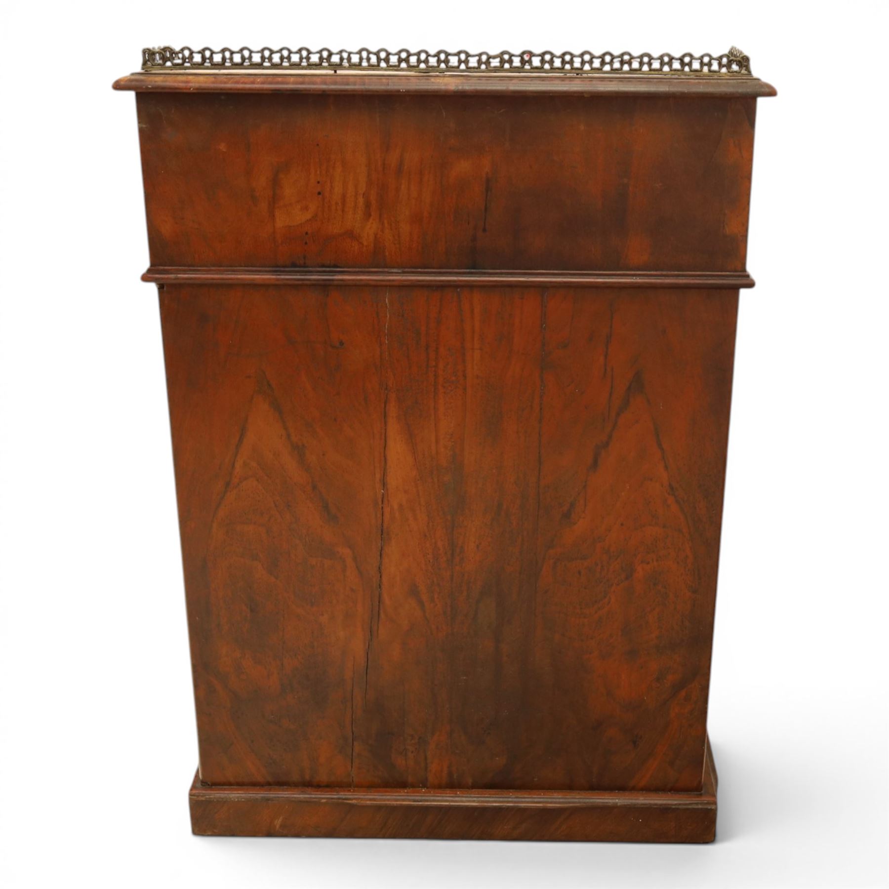 Victorian figured walnut Davenport, the fixed fall with drawer to the side enclosing writing compartment, green tooled leather writing inset, galleried back rail, right side fitted with four drawers behind a panel, opposing panelled side, raised on carved cabriole front supports with scroll terminals and platform base