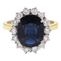 18ct gold sapphire and round brilliant cut diamond cluster ring, hallmarked, sapphire approx 3.25 carat, total diamond weight approx 0.85 carat
