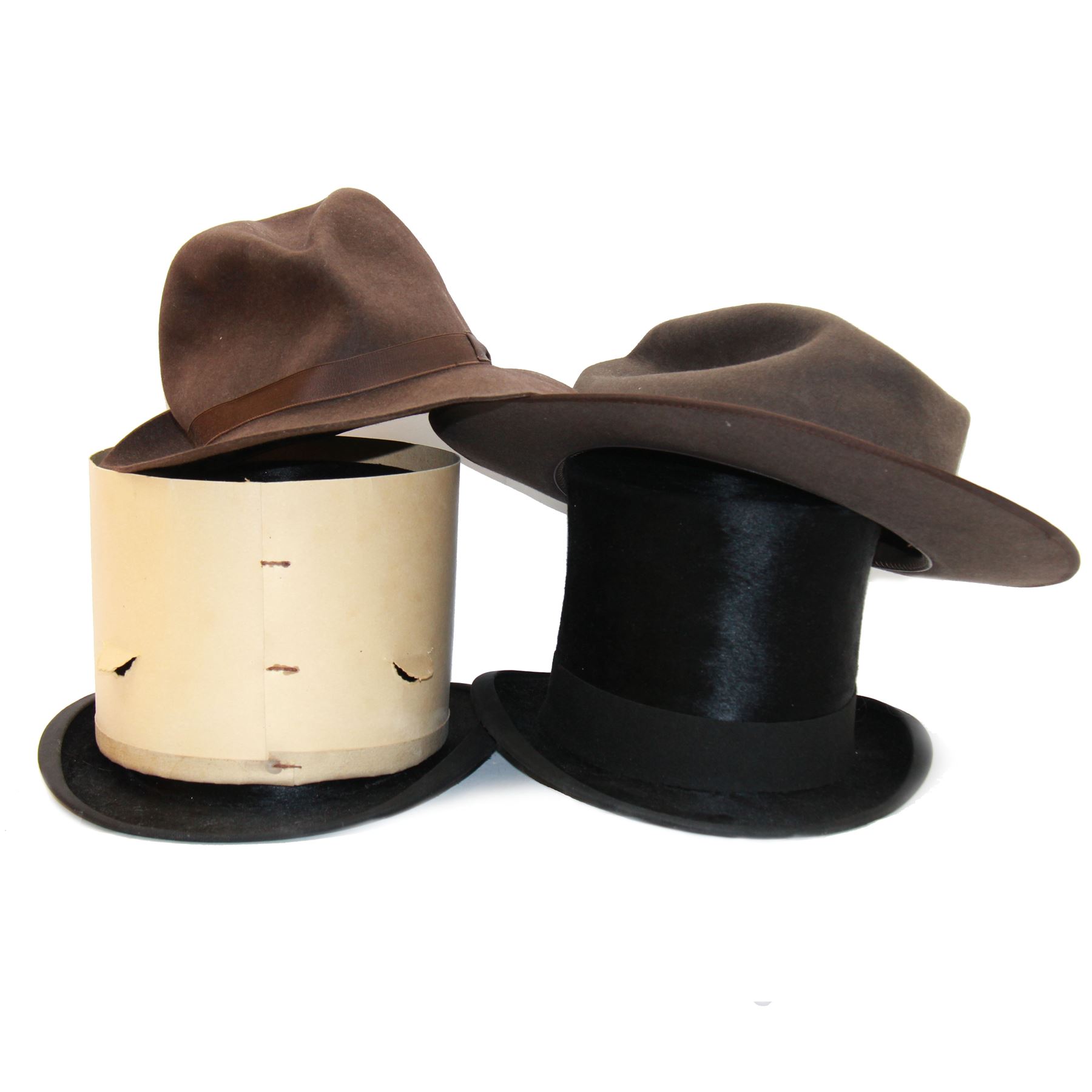 Akubra pure fur felt trilby hat, together with another trilby and two top hats, one by Woodrow and one by Dunn & Co