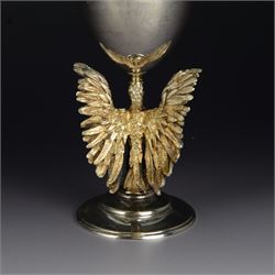 Modern limited edition silver goblet, 'made by order of the Dean and Chapter of St Paul's to commemorate the 300th anniversary of the laying of the foundation stone of the cathedral in 1675', designed by Jocelyn Burton for Aurum, the plain bowl with gilt interior, upon a parcel gilt stem in the form of a phoenix with wings outstretched,  limited edition no. 497, hallmarked Jocelyn Burton, London 1975, H16cm, boxed