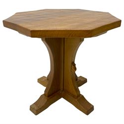 Mouseman - oak occasional table, octagonal adzed top on cruciform base with sledge feet, carved with mouse signature, by the workshop of Robert Thompson, Kilburn 