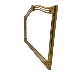 Deknudt Mirrors - Belgian gilt cushion framed wall mirror, arched top with central stylised fleur-de-lis decoration and cartouche corners