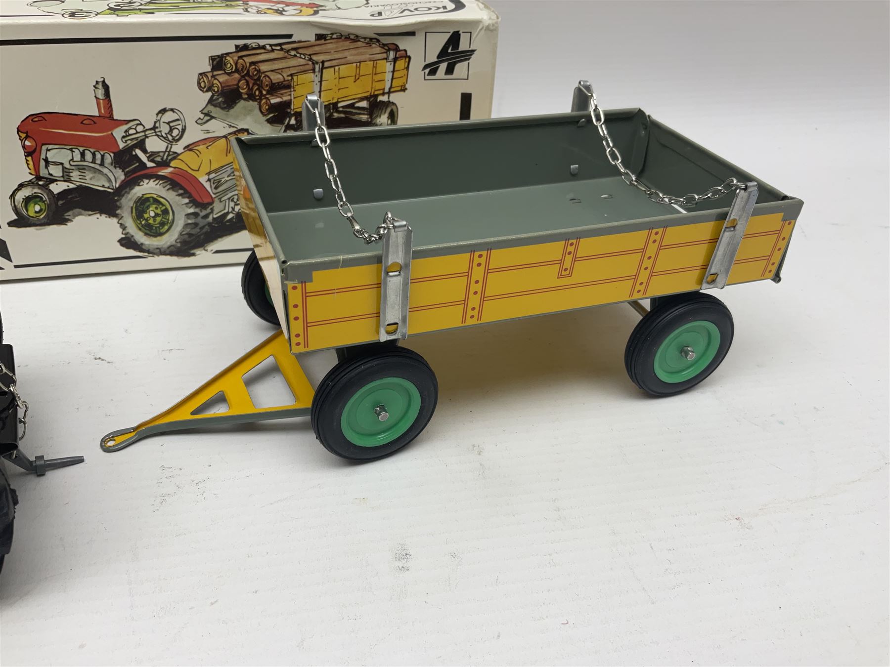 Kovap - eleven tinplate models to include Tractor and Trailer, Road Roller 1927, Moving Moneybox 1924, Hawkeye type B 1924, Boy on a Tricycle; all in original boxes 