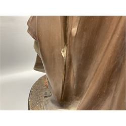 Two religious painted plaster figures of Mary and Joseph kneeling on oval plinths, with impressed mark 'Raffl et Cie Paris', H60cm 