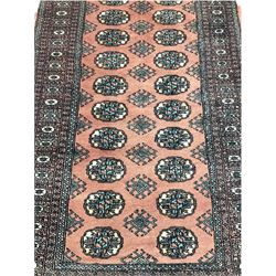 Small Persian Bokhara rug, pink ground