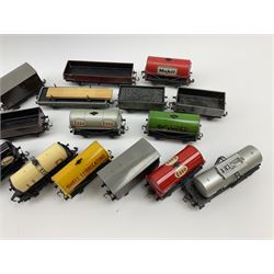 Hornby Dublo - twenty unboxed wagons including nine tank wagons for United Dairies, Traffic Services, Power Petrol, Mobile, Shell, Vacuum and Esso, covered wagons, open wagons, timber carrier, cable drum wagon etc (20)
