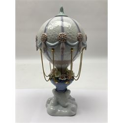 Lladro Flying High, modelled as a hot air balloon, with brass chains to suspended blossom filled basket, no 6523, with original box, H23cm