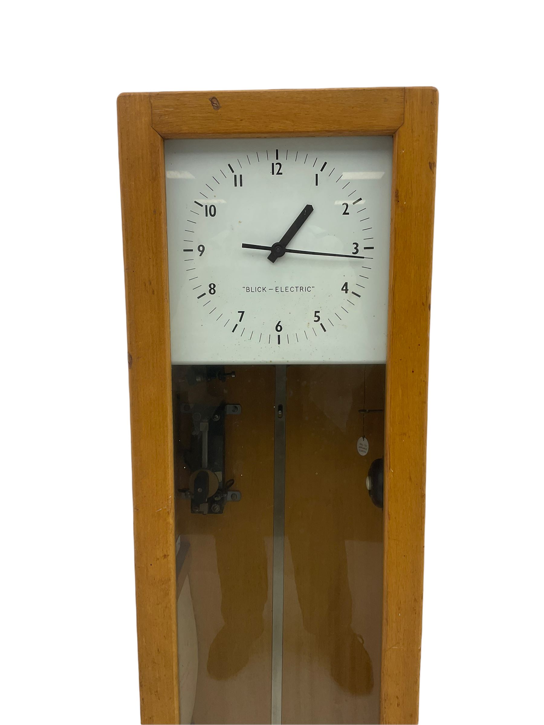 A mid-20th century Gent of Leicester(Blick Electric) Pulsynetic Master Clock in a full length glazed wooden case, with a square white dial with Arabic numerals, minute markers and baton hands, with pendulum and a record card dating from the 1970’s. 
This master clock would have been wired to send time signals to other slave dials in a large building, frequently used in hospitals, schools and factories during the 20th century
With a second electrical movement housed in a glazed square cabinet.


